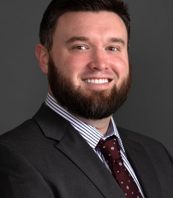 Portrait of Sam Williams, REALTOR®.